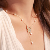 Elegant Silver Butterfly Necklace with Faux Pearls