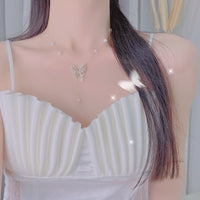 Elegant Silver Butterfly Necklace with Faux Pearls