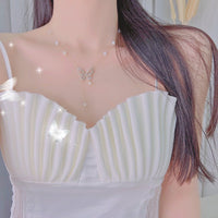 Elegant Silver Butterfly Necklace with Faux Pearls