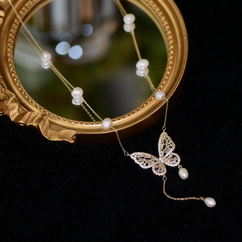 Elegant Silver Butterfly Necklace with Faux Pearls