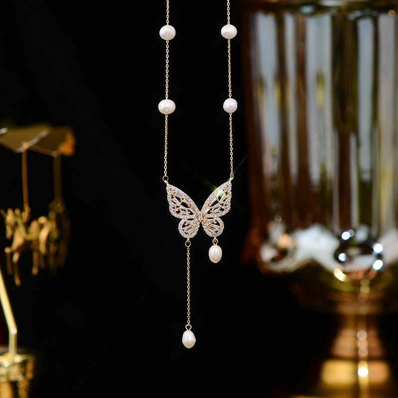 Elegant Silver Butterfly Necklace with Faux Pearls